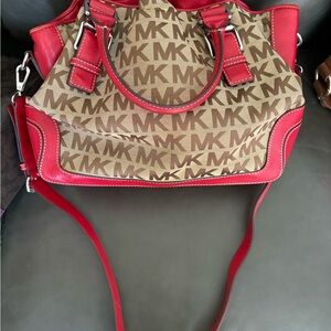 Red and brown Micheal Kors shoulder or crossbody bag
